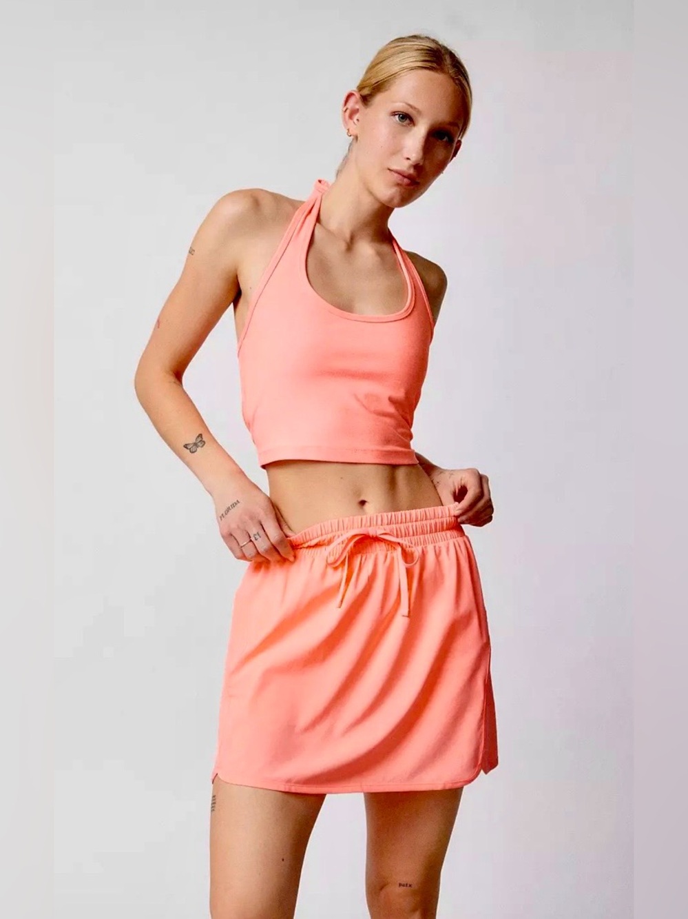 NWT BEYOND YOGA IN STRIDE SKORT ELECTRIC PEACH MEDIUM